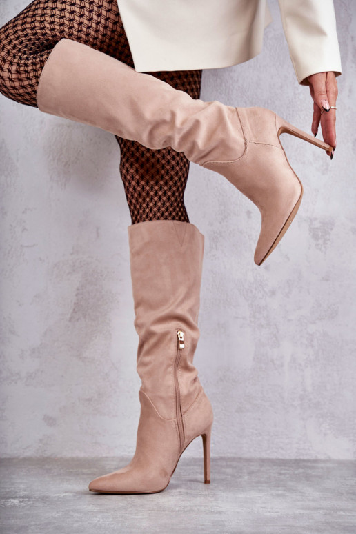 Classic Suede Black Boots On A Beige Ameya