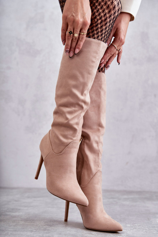 Classic Suede Black Boots On A Beige Ameya