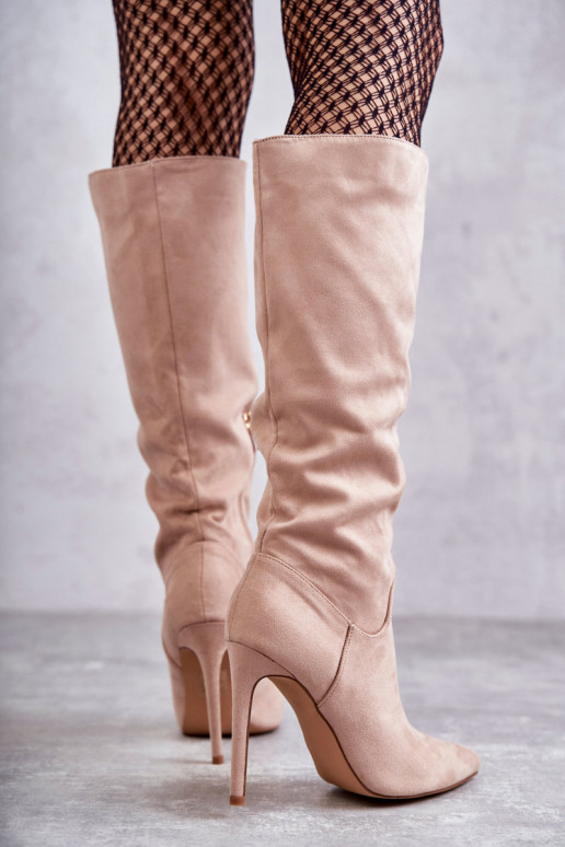 Classic Suede Black Boots On A Beige Ameya