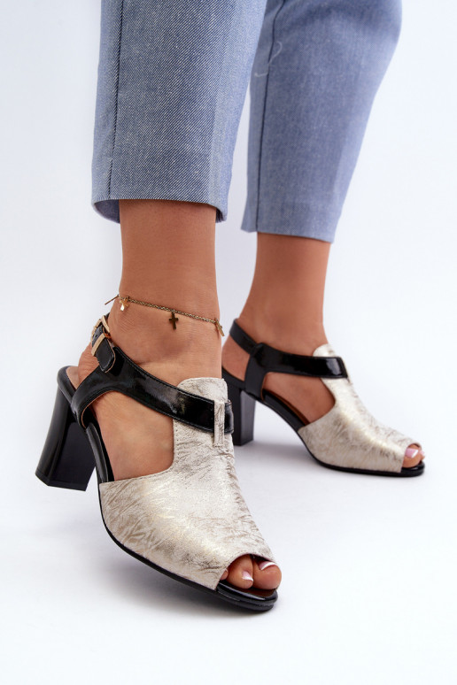 Women's sandals with a heel made of eco-leather in gold-black Queenmarie Women's sandals with a heel made of eco-leather in gold-black Queenmarie