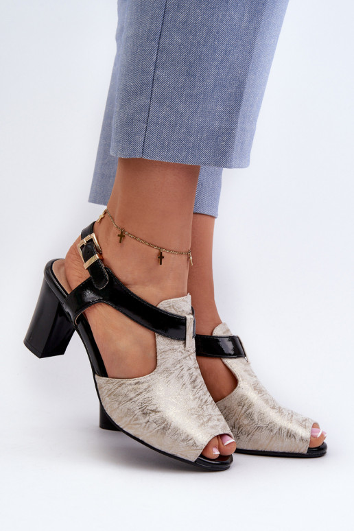 Women's sandals with a heel made of eco-leather in gold-black Queenmarie Women's sandals with a heel made of eco-leather in gold-black Queenmarie