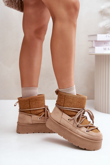 Snow boots with stylish details with platform in brown