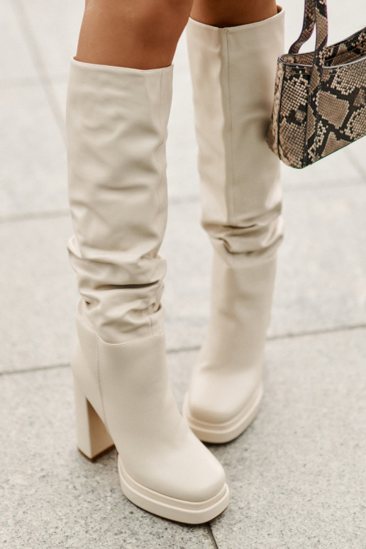 Slip-on ankle boots on a heel and platform with gathering warm light beige Beridra