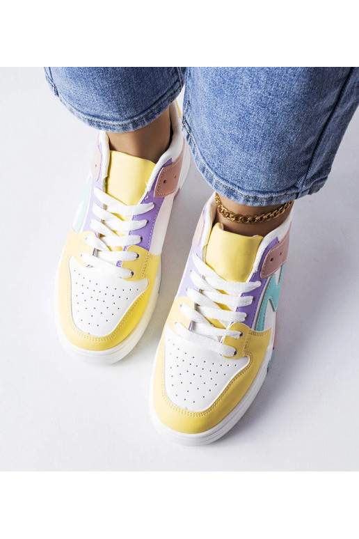 Różowo-żółte buty na grubszej...