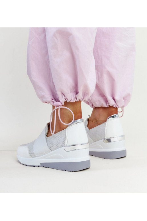Białe sneakersy na koturnie Kallay