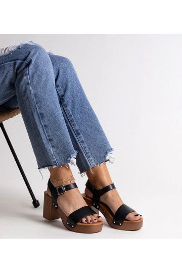 Black sandals on a block...