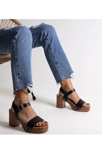Black sandals on a block... 2