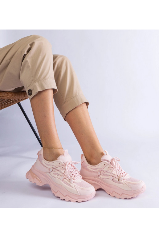 Różowe sneakersy sportowe na masywnej...