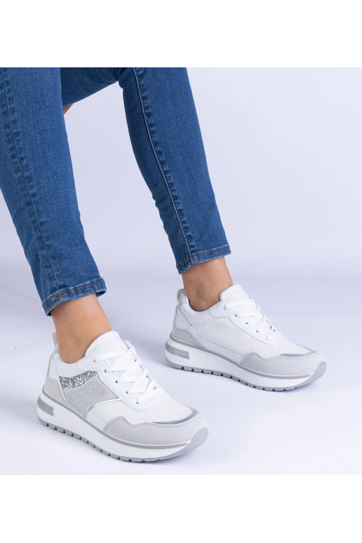 Białe sneakersy zdobione brokatem i... Białe sneakersy zdobione brokatem i...