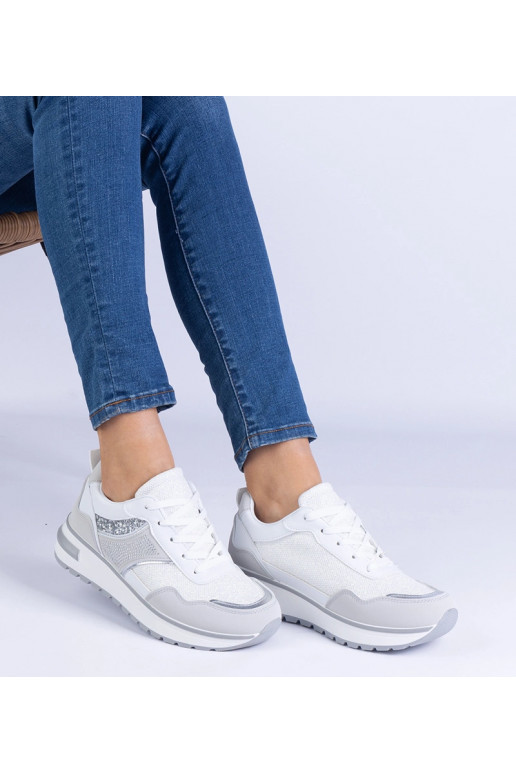 Białe sneakersy zdobione brokatem i... Białe sneakersy zdobione brokatem i...