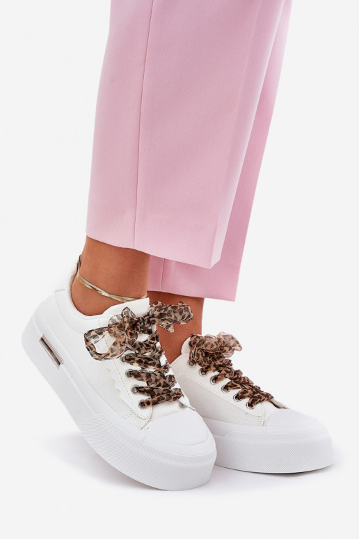 Women's sneakers on a chunky platform with decorative lacing white Zidora Women's sneakers on a chunky platform with decorative lacing white Zidora