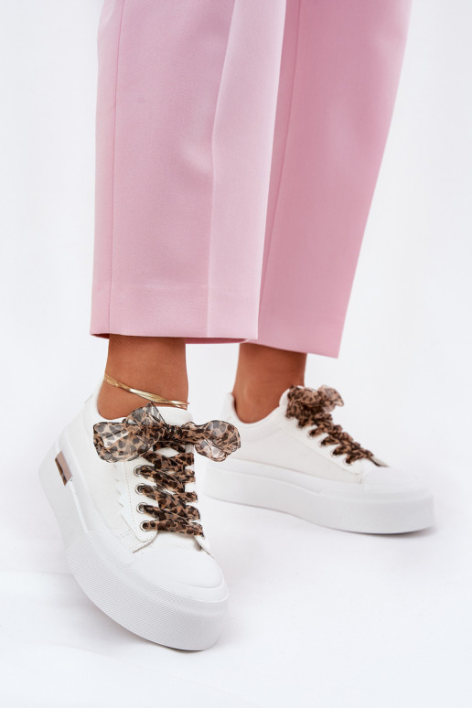 Women's sneakers on a chunky platform with decorative lacing white Zidora Women's sneakers on a chunky platform with decorative lacing white Zidora
